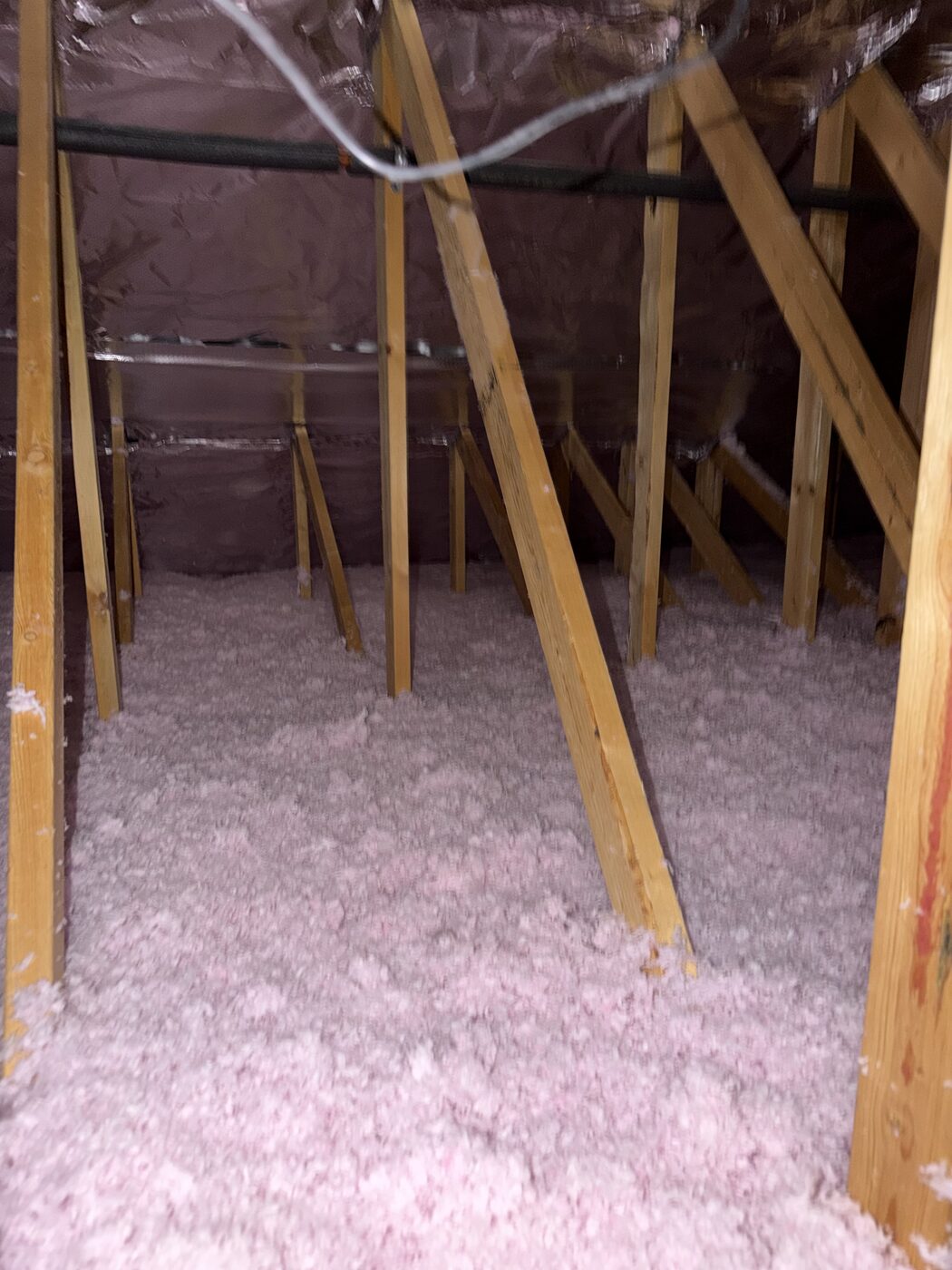 AtticPro job photo: full-depth insulation in a vaulted attic — Denver metro