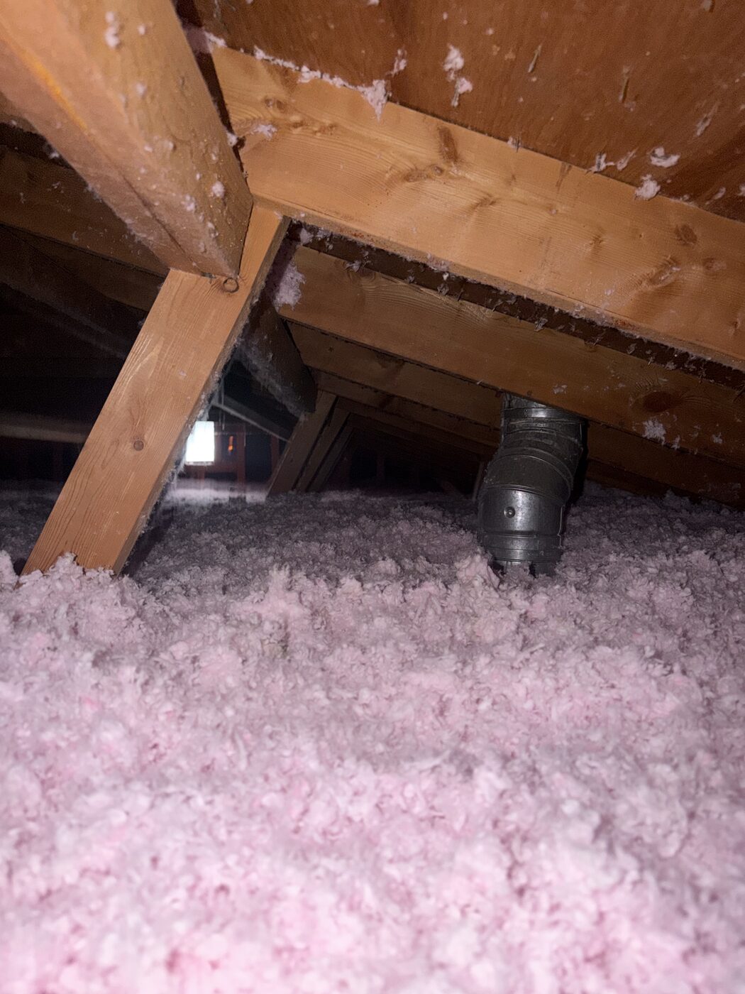 AtticPro job photo: insulation built up around ductwork and pipes — Denver metro